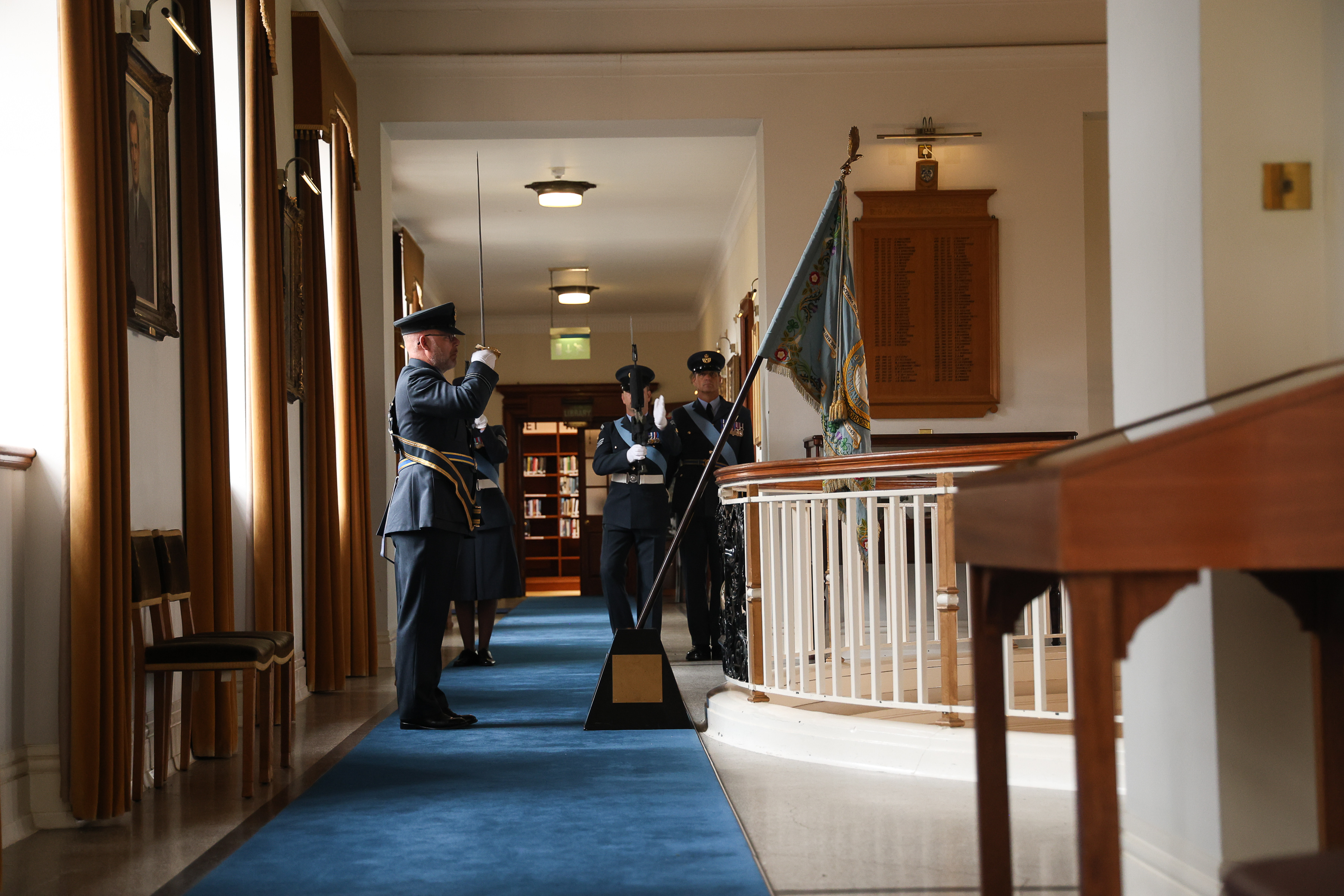 Photo of Number 47 Squadron Standard lodgement in the Rotunda of College Hall Officers’ Mess at RAF College Cranwell.